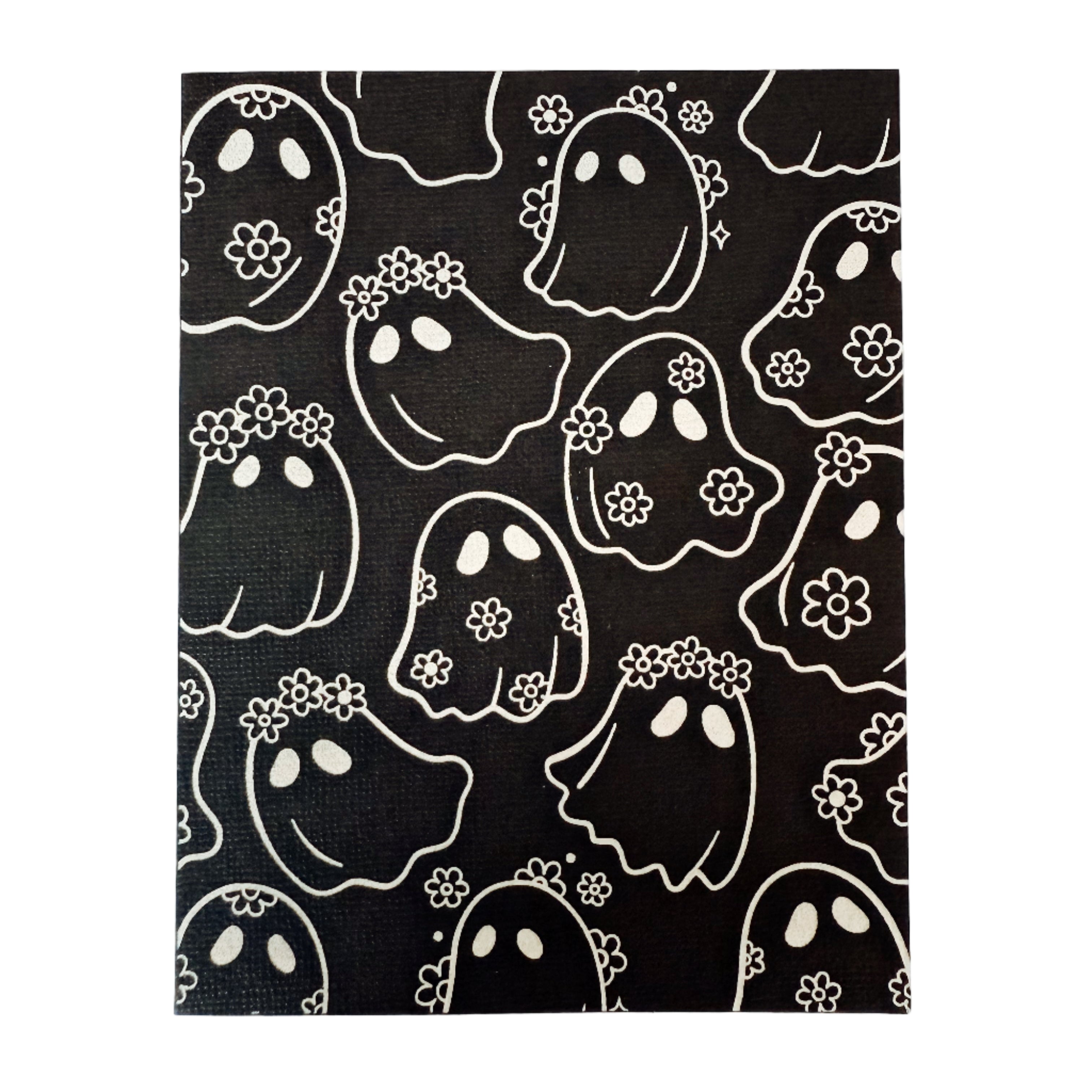 Greeting card with pattern of black daisy ghosts with white outlines on a black card background