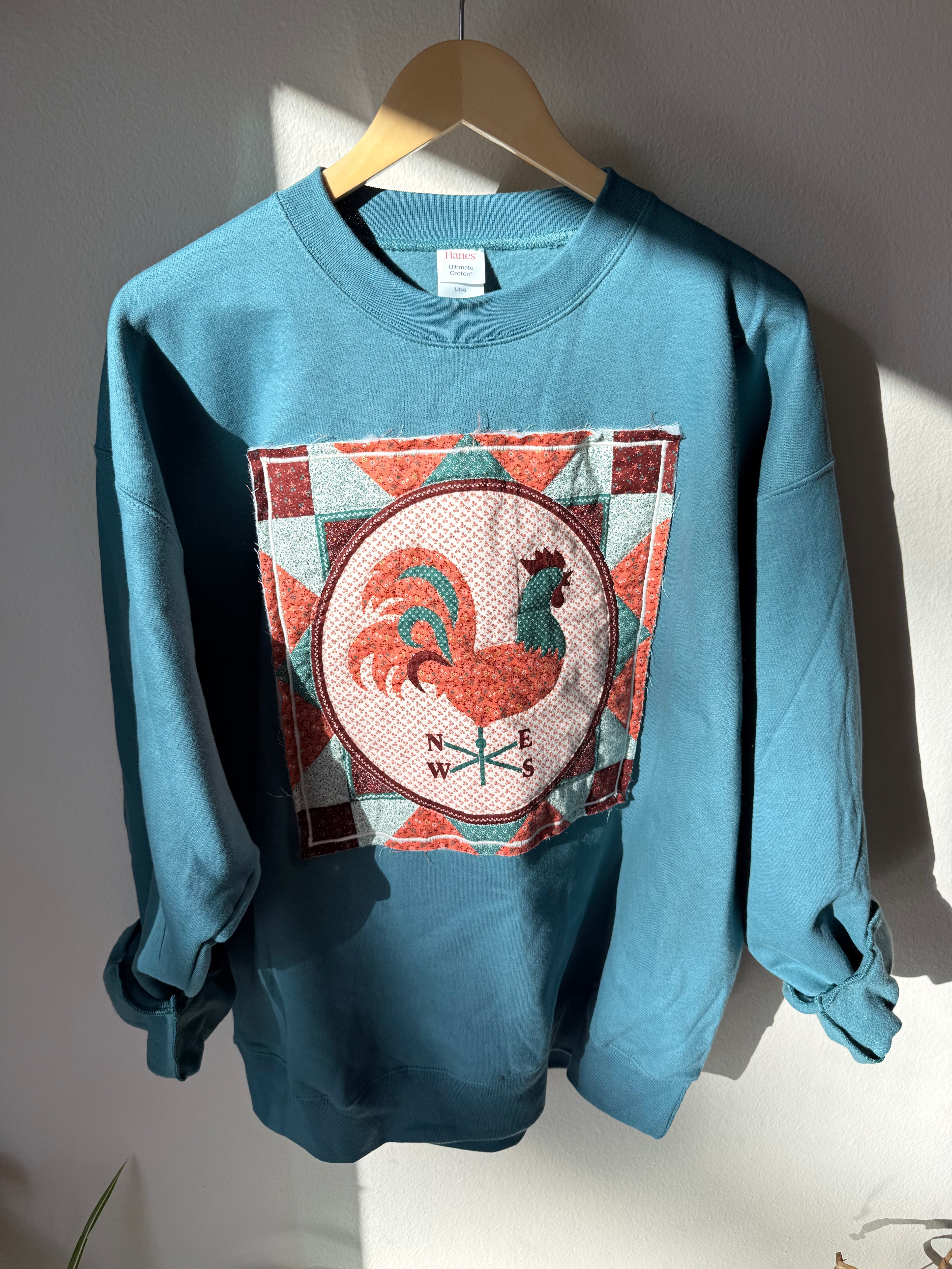 Calico Weathervane Appliqué Sweatshirt, Large, Turquoise