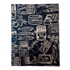 Patterned greeting card with sardine cans and fish on a navy blue background
