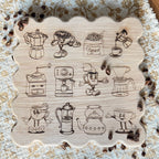 Scalloped wooden cutting board with retro coffee illustrations engraved in the wood on a placemat.
