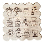 Wooden cutting board with retro coffee illustrations engraved on the wood. 
